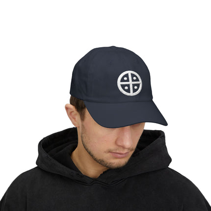 Embroidered solar cross symbol baseball cap. Dark navy unisex hat featuring ancient sun wheel design.
