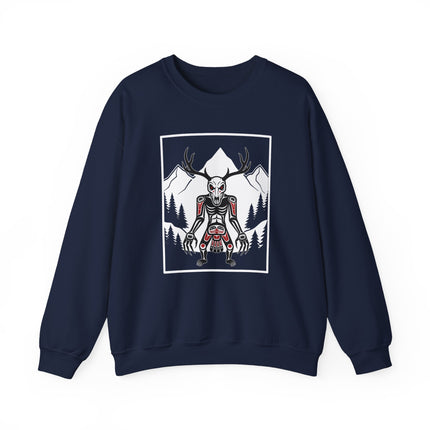 Wendigo skull, antler, and forest mountain graphic on a cryptid folklore pullover sweatshirt.