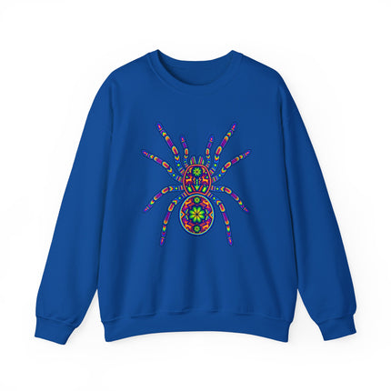 Colorful Huichol-style tarantula graphic on a blue sweatshirt.