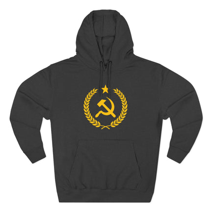 Gold hammer and sickle emblem within a laurel wreath on a black hoodie.