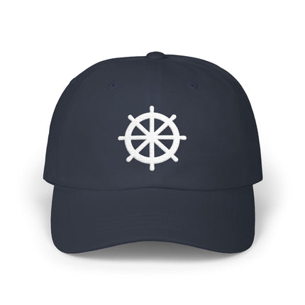 Embroidered Dharma Wheel symbol on a navy blue baseball cap.