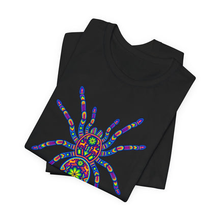 Huichol tarantula graphic tee with vibrant rainbow mandala folk art design.