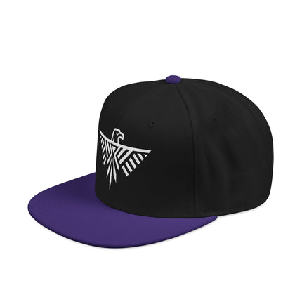 Black snapback hat featuring white geometric thunderbird embroidery.
