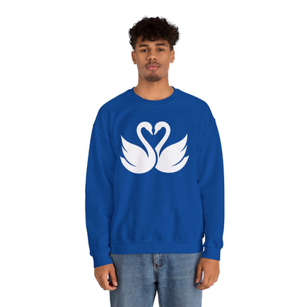 Swans forming a heart graphic on a blue pullover sweatshirt.