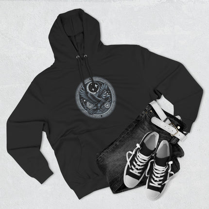 Norse raven and celestial moon graphic on black Viking style pullover hoodie.