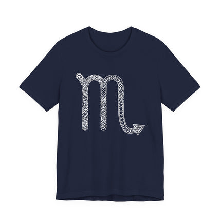 Tribal Scorpio zodiac sign graphic on a navy blue t-shirt.