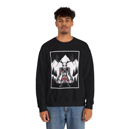 Wendigo antler skull graphic set against a mountain forest landscape design.