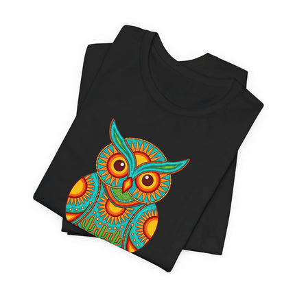 Vibrant Huichol owl graphic tee in Mexican folk art style. Bohemian desert alebrije design.