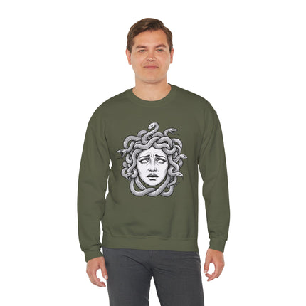 Medusa head graphic featuring snakes for hair, inspired by Greek mythology and Gorgon lore.