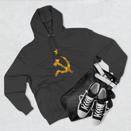 Black hoodie featuring a yellow distressed communist hammer and sickle symbol.