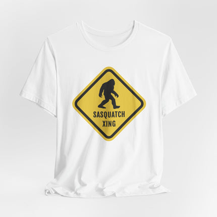 Bigfoot Sasquatch crossing sign graphic on a white t-shirt.