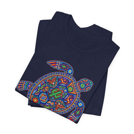 Vibrant Huichol art turtle graphic tee featuring intricate Mexican indigenous patterns and symbolism.