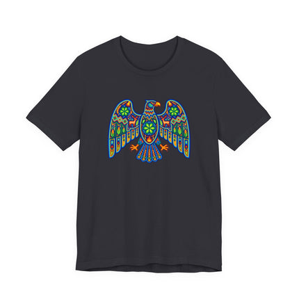 Vibrant Huichol eagle graphic tee featuring Mexican indigenous folk art design.