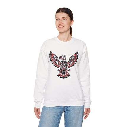 White sweatshirt featuring a stylized Indigenous Pacific Northwest tribal eagle graphic.