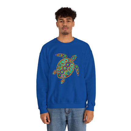 Blue sweatshirt featuring a colorful geometric turtle design inspired by Mexican Huichol folk art.