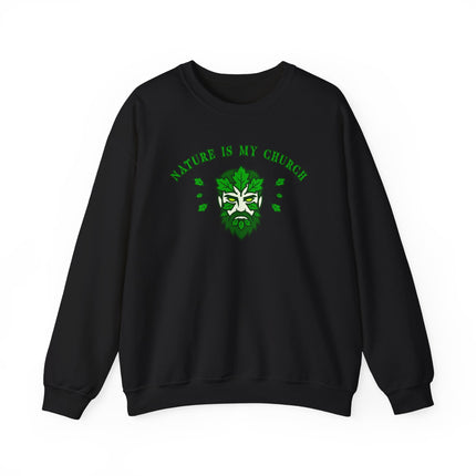 Green Man nature graphic on black sweatshirt: "Nature Is My Church" text.