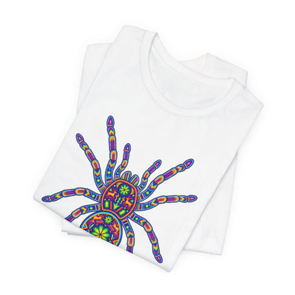 Vibrant Huichol tarantula graphic tee featuring psychedelic Mexican folk art.