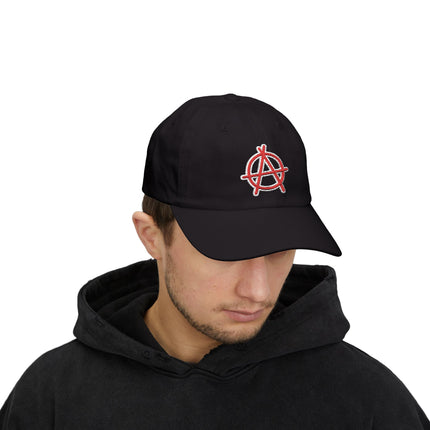 Black baseball cap with red embroidered anarchy symbol. Streetwear graphic cap.