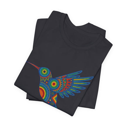 Colorful Huichol hummingbird graphic tee featuring vibrant Mexican folk art patterns.