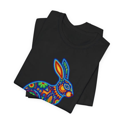 Vibrant Huichol-style rabbit graphic tee featuring Mexican folk art on a black shirt.