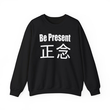 Black sweatshirt featuring "Be Present" and the 正念 kanji for mindfulness and zen apparel.