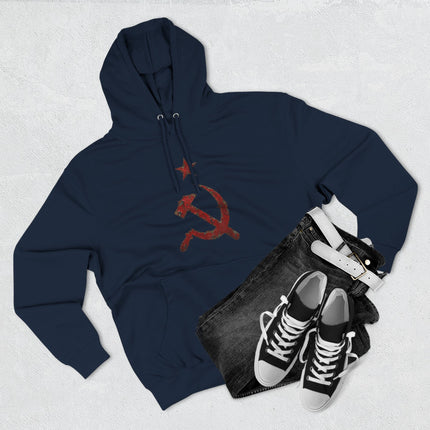 Distressed red hammer and sickle communist symbol graphic on a navy pullover hoodie.