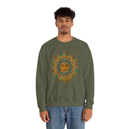 Vibrant Mesoamerican sun symbol graphic on a green sweatshirt, inspired by Huichol indigenous art.