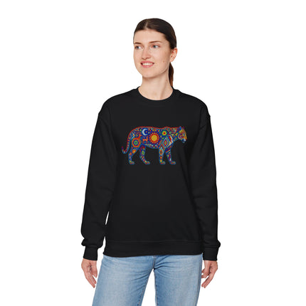 Vibrant tribal jaguar graphic featuring geometric Huichol-inspired patterns on a black sweatshirt.