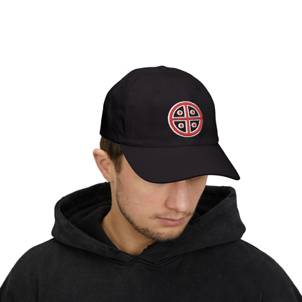 Black baseball cap featuring a red embroidered solar cross symbol.