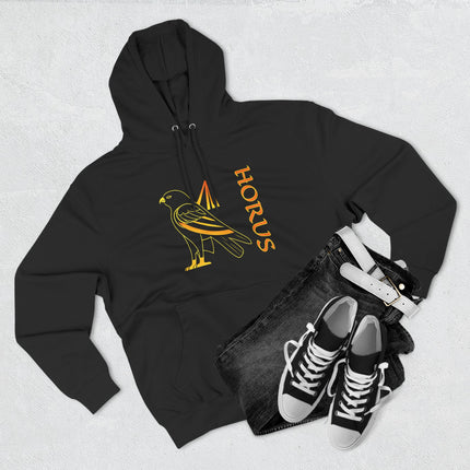 Black hoodie featuring a golden Horus falcon graphic and "HORUS" text, inspired by Egyptian mythology.