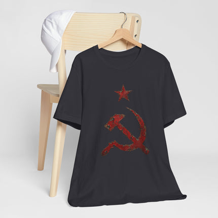 Red distressed hammer and sickle star graphic on a black t-shirt.