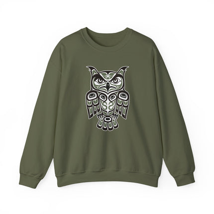 Formline art owl graphic on a red and black Pacific Northwest sweatshirt.