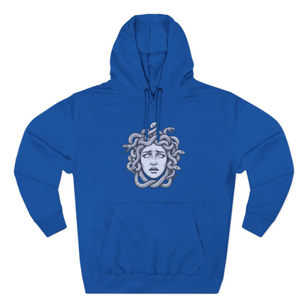 Medusa gorgon head graphic print on a blue hoodie, featuring snakes for hair.