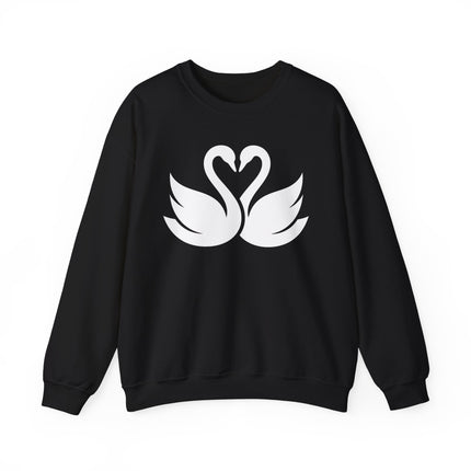 Minimalist white swans forming a heart graphic on a black pullover sweatshirt.
