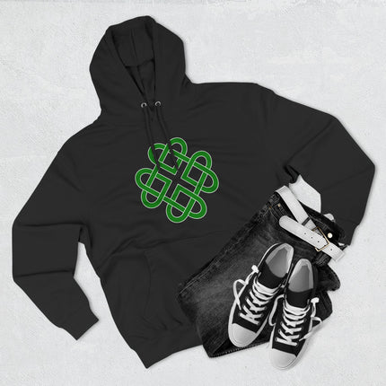 Green Celtic knot clover symbol graphic on a black pullover hoodie.