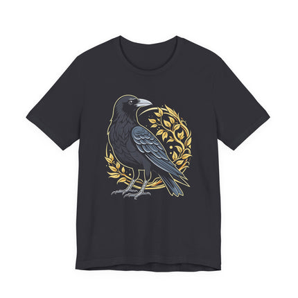 Norse raven graphic tee featuring a crow surrounded by golden leaves and foliage.