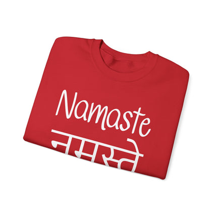 Red sweatshirt featuring "Namaste" and "नमस्ते" Devanagari script for Indian culture and yoga wear.