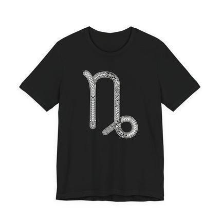 Intricate Capricorn zodiac symbol graphic on a black t-shirt.
