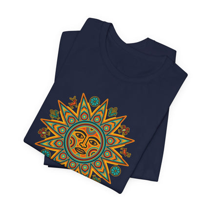 Colorful Huichol sun face graphic tee shirt featuring indigenous Mexican folk art and vibrant symbolism.