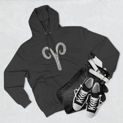Aries zodiac tribal symbol graphic on a black pullover hoodie.