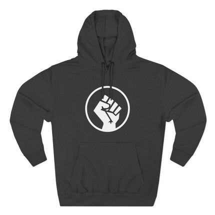 Raised fist symbol graphic on a black hoodie, representing solidarity and protest activism.
