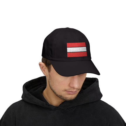 Embroidered Austrian flag baseball cap on black background. Show your national pride.
