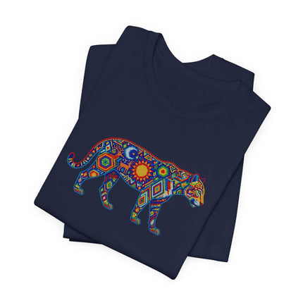 Vibrant mosaic jaguar tee featuring Huichol-style cosmic sun and moon art.