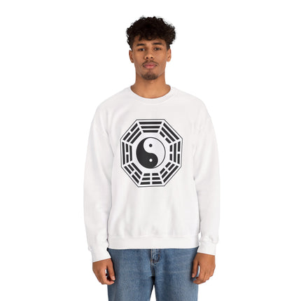 Stylized Yin Yang Taijitu symbol graphic on a white pullover sweatshirt.