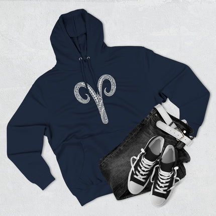 Aries zodiac tribal symbol graphic on a navy pullover hoodie.
