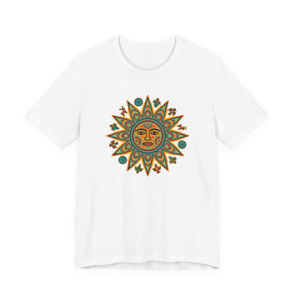 Colorful Huichol sun face graphic tee featuring indigenous Mexican folk art and sun symbolism.