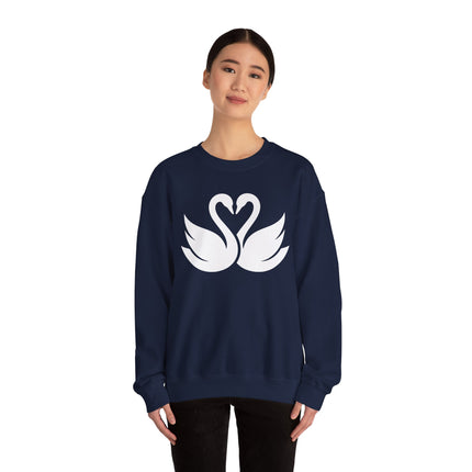 Swans forming a heart graphic on a navy blue pullover sweatshirt.