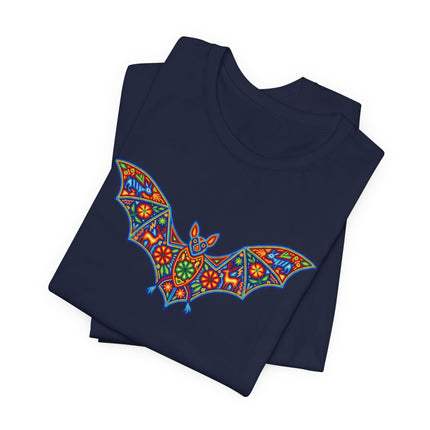 Vibrant Mexican folk art bat design on a navy blue graphic tee.