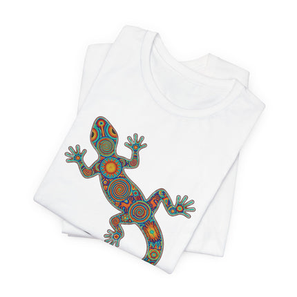 Vibrant geometric lizard print inspired by Mexican Huichol folk art on a white tee.