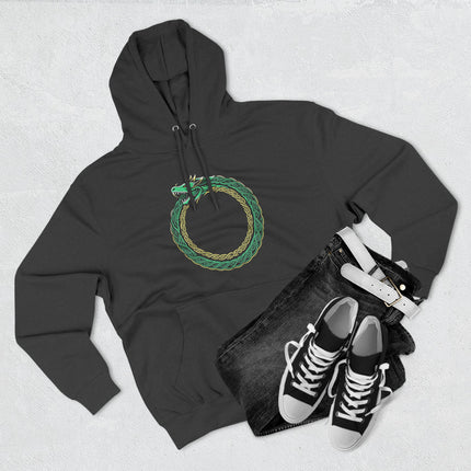 Norse Ouroboros dragon knotwork symbol in green and gold.